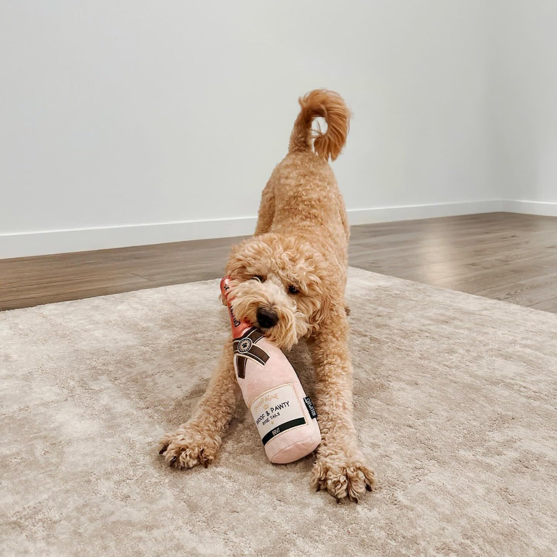 CHEWFFON Dog Toy, Pink Champagne Shape Squeaky Toy for Boredom